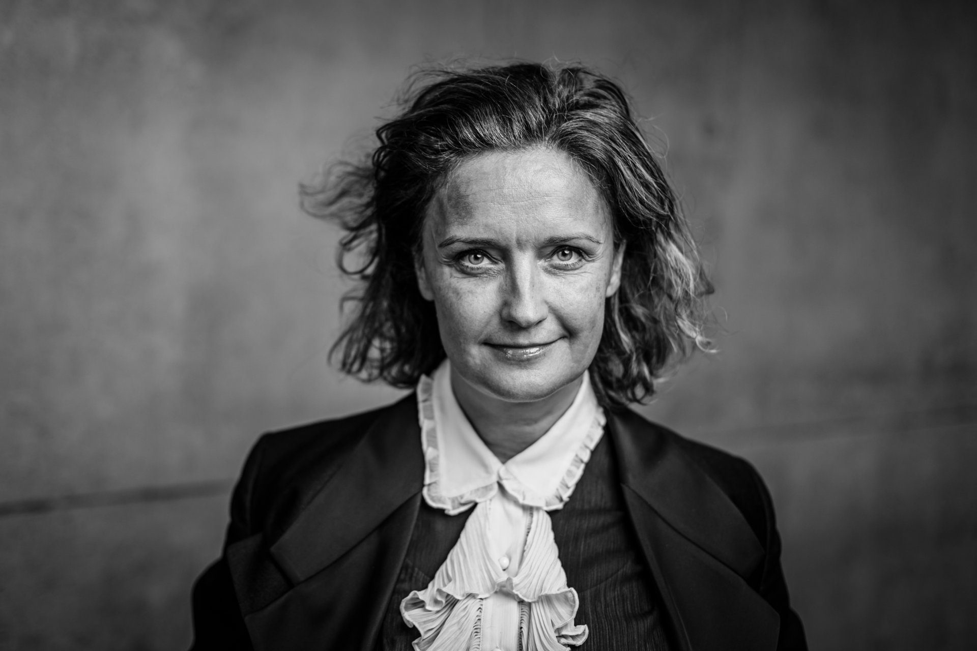 Marta Nordal leikhússtjóri með kynningu fyrir afmælistónleika SN